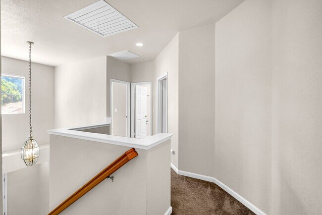 Building Photo - Move-In Ready 4-Bed, 3-Bath Gem in a Covet...