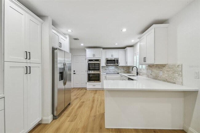 Building Photo - 4802 W Longfellow Ave