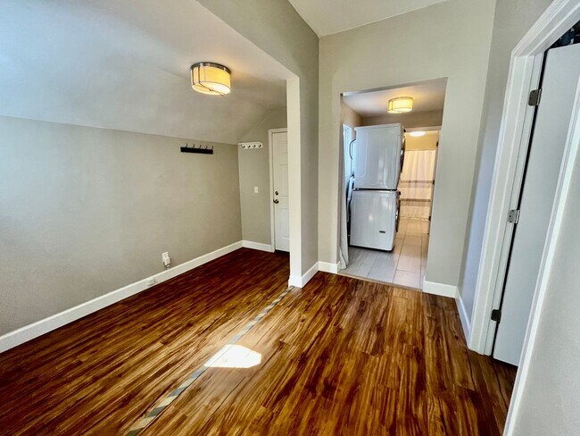 Building Photo - Prime Location! Modern 2BD/1 BA with A/C & EV Charging Steps from Mississippi
