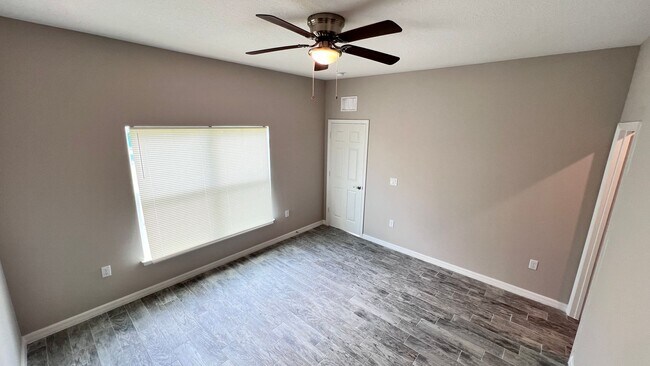 Building Photo - Spacious 3-Bedroom Home with Garage & Pati...