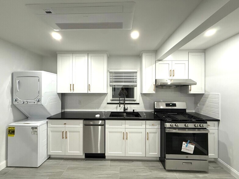 Unit 2 Kitchen with In Unit Washer and Dryer - 3334 208th St