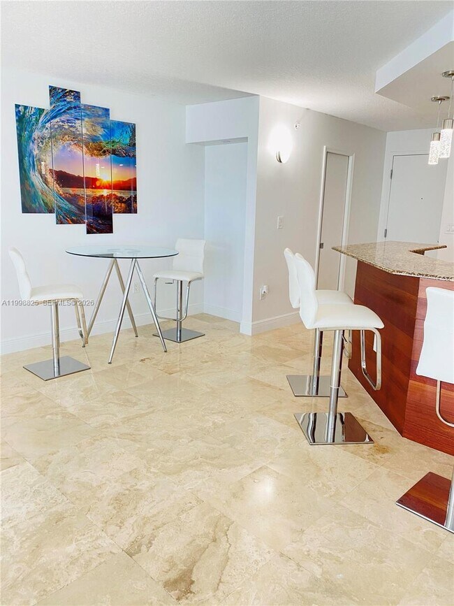 Building Photo - 6917 Collins Ave