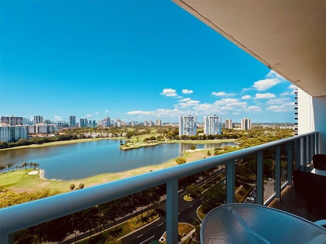 Building Photo - 3675 N Country Club Dr