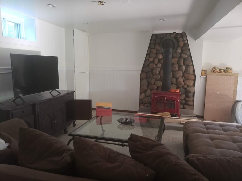 Living room with wood burning stove - 25 Pinehurst Rd