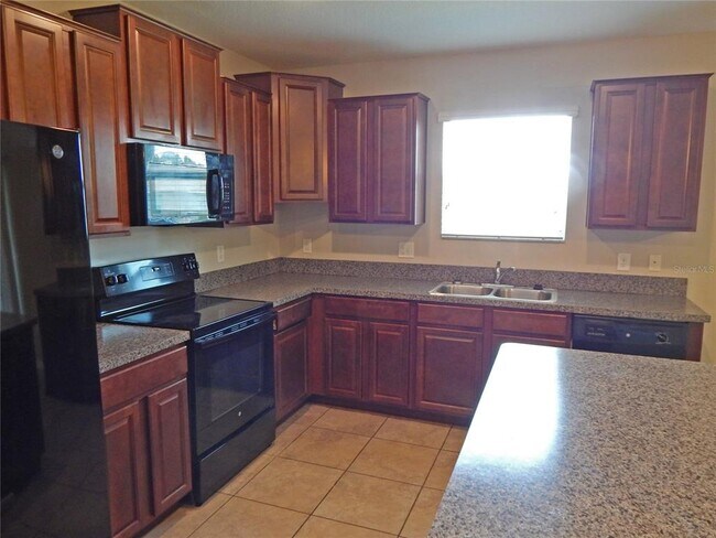 Building Photo - 10259 Strawberry Tetra Dr