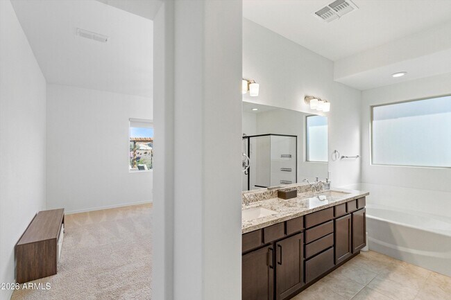 Building Photo - 10812 E Tesla Ave