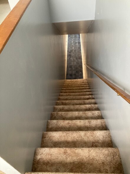 staircase to apartment - 310 N University Ave