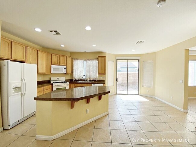Building Photo - 9057 Spinning Wheel Ave