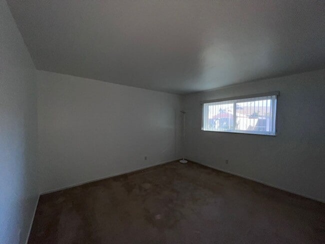 Building Photo - Freshly painted home with large backyard. ...