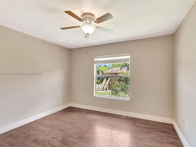 Building Photo - 4847 Via Palm Lakes