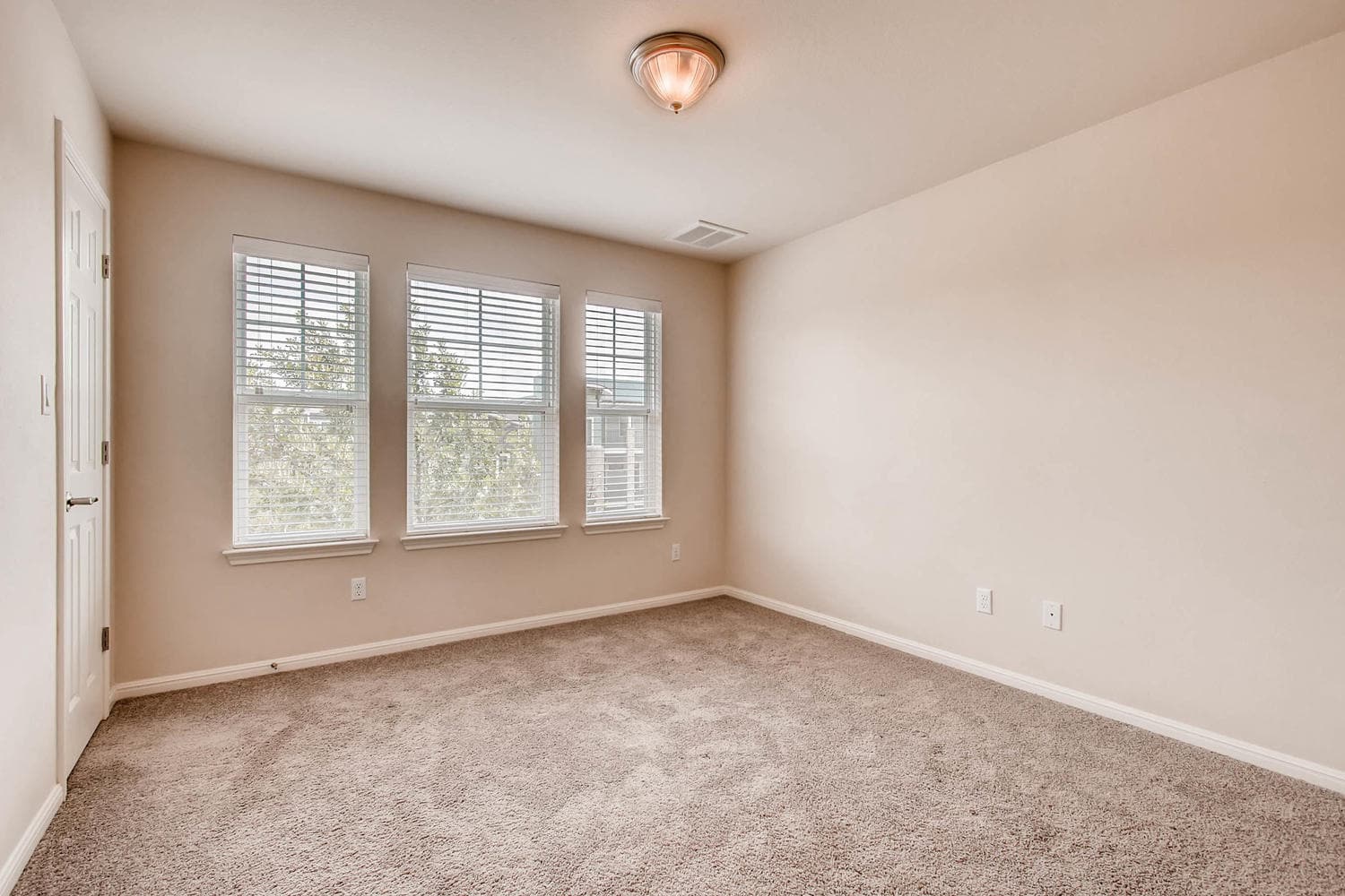 Upstairs 2nd bedroom. Look at at all the natural light from those windows! - 1813 Carlson Drive