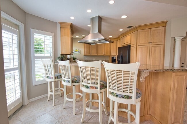 Building Photo - Seasonal Short-Term 2 Bed 2 Bath Heated Pool Villa with a Den in Harrington Lakes at Planation Go...