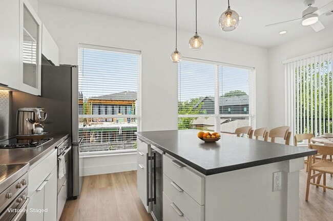 Building Photo - Be the first to live in Unit 207 at 2217 Fitzhugh—a brand-new 2026 construction offering 601 sq f...