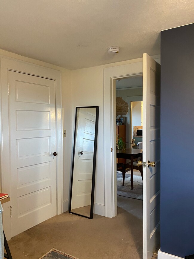 bedroom walk-in closet with shelving - 340 NE Beyrl Ter