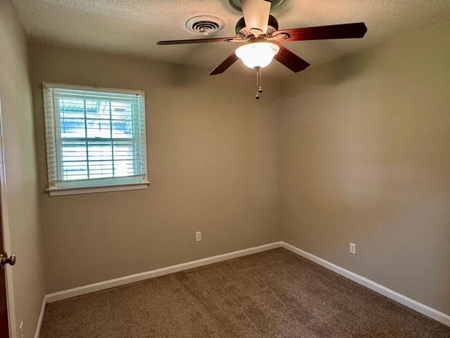 Building Photo - Check Out This 3 Bedroom / 2 Bathroom BRIC...