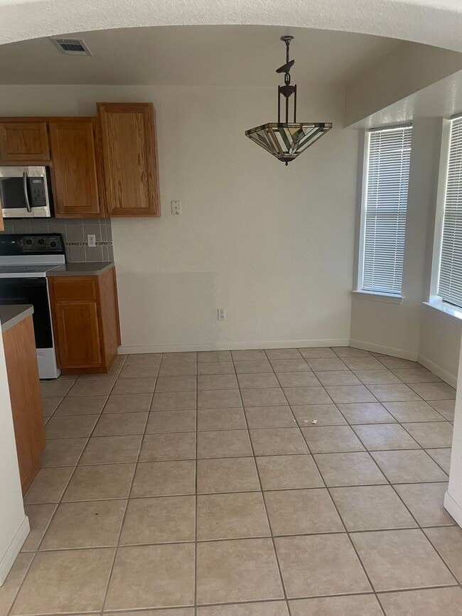 Building Photo - Super Cute Corner Lot House Ready to be called your HOME.