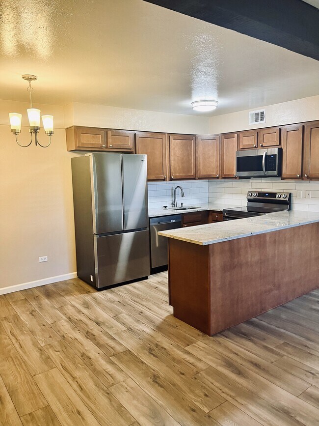 Building Photo - 3663 S Sheridan Blvd