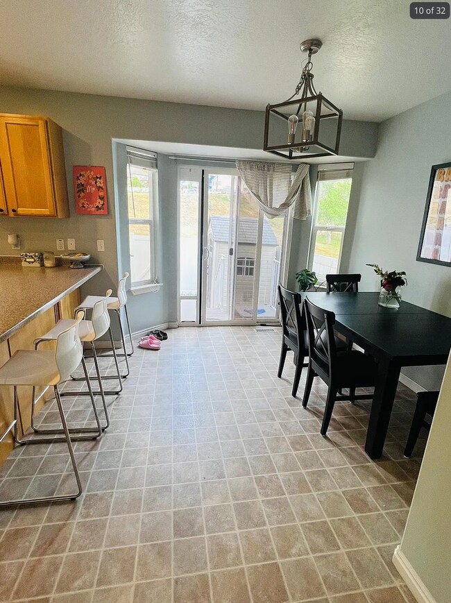 Building Photo - Spacious End-Row Townhome