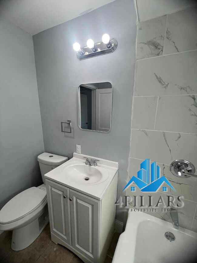 Building Photo - "Charming 3-Bed Home with Partially Finished Basement & Gleaming Hardwood Floors in Hammond - 226...