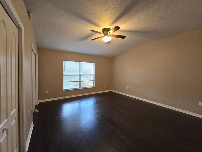 Building Photo - Great Town Home in Gated Community with Pool and Pond View