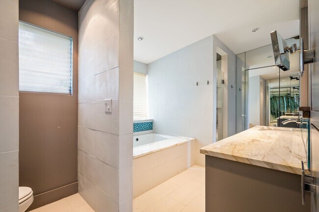 Building Photo - 2/2 with carport - fenced backyard