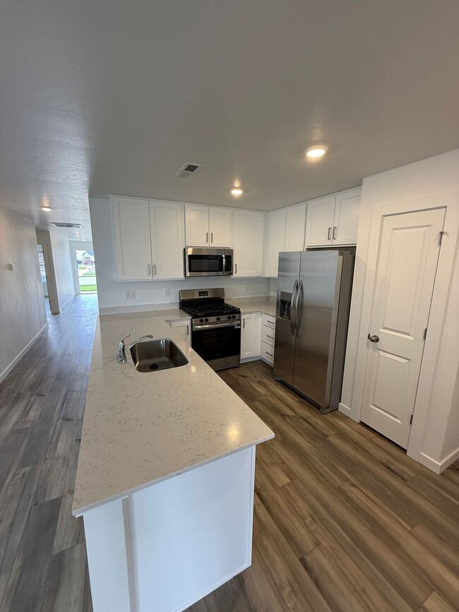 Building Photo - First Full Months Rent Free!-Beautiful 4 b...