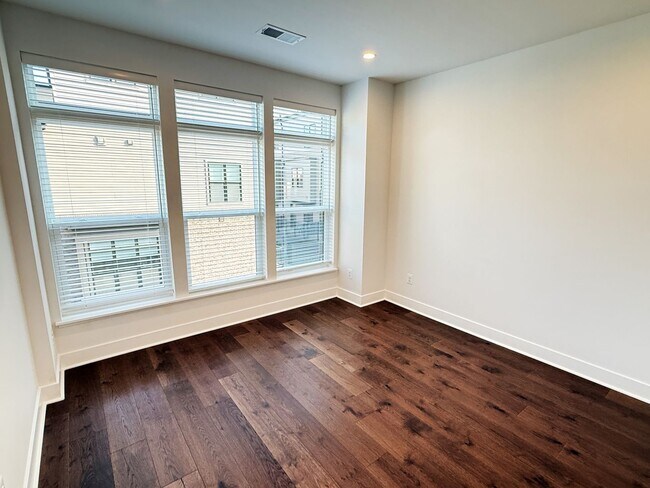 Building Photo - Brand new 4 level, 4 Bedroom Townhome with Elevator!