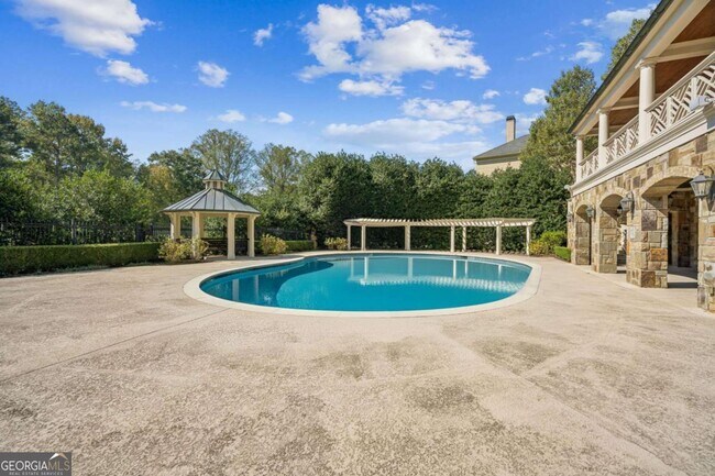 Building Photo - 9026 Riverbend Manor