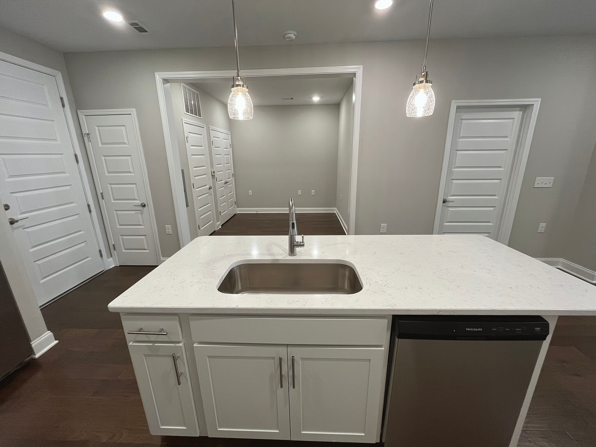 View of Kitchen Island looking into Flex Room - 4000 Shadow Green Dr