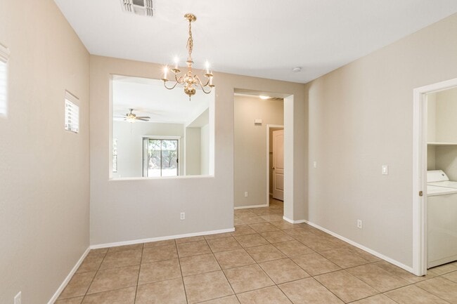 Building Photo - Bright Open Living & a Patio Perfect for Relaxing!