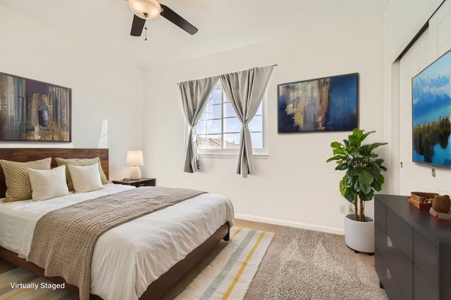 Building Photo - Modern 2-Bed Townhouse with Private En-Suites, Parking for 3 Cars  & Community Amenities