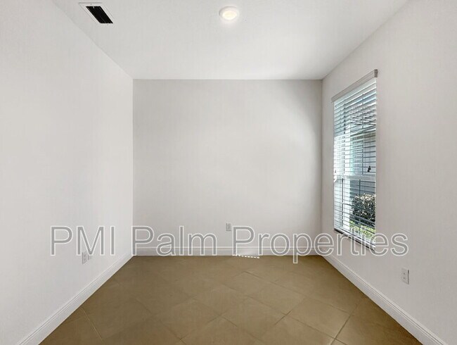 Building Photo - 9870 SW Trumpet Tree Cir