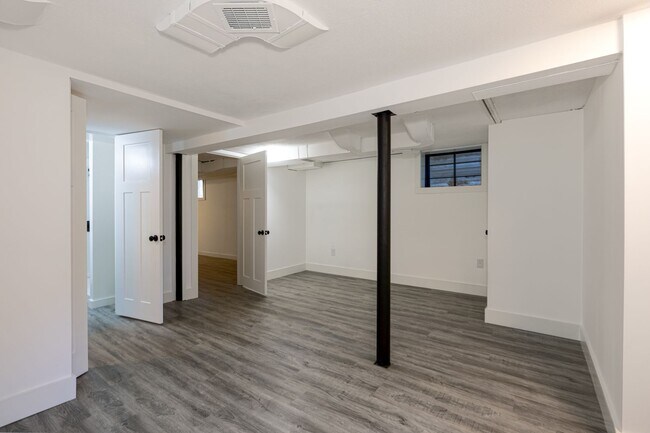 Building Photo - Charming home with a finished basement and...