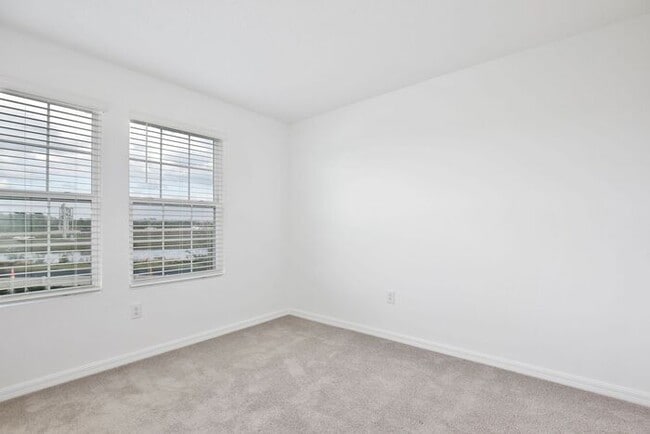 Building Photo - Luxurious 3/2.5 Modern Townhome with a Private Balcony and a 2 Car Garage in the Exclusive Gated ...