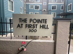 Building Photo - Bright, Modern 1BR Near Hospitals, SU & Transit in secure building with garage parking and a Walk...