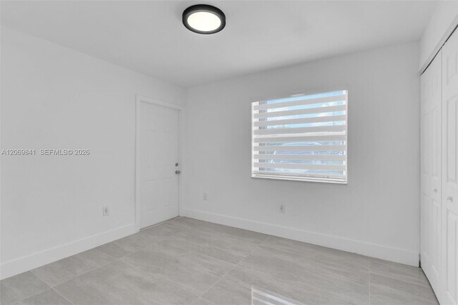 Building Photo - 9999 NW 25th Terrace