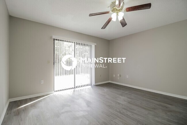 Building Photo - 4 Bedroom Pet-Friendly Home in Deltona, FL with Main Street Renewal