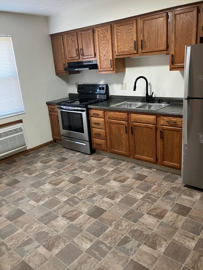 Building Photo - Spacious 2-Bedroom Living in a Quiet Commu...