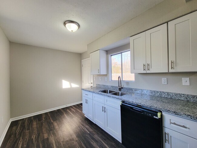 Building Photo - REMODELED/ UPDATED 4 BEDROOM 2 BATH WITH C...