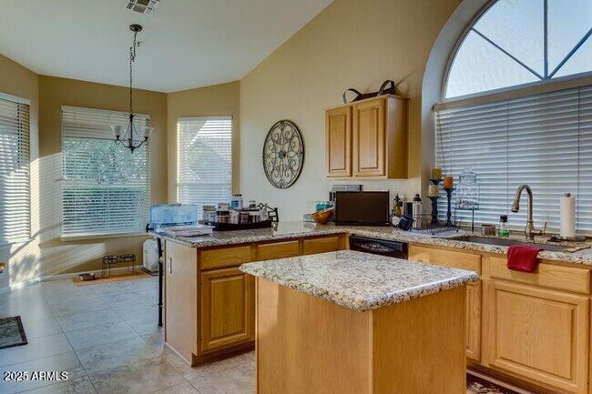 Building Photo - 9113 E Palm Tree Dr