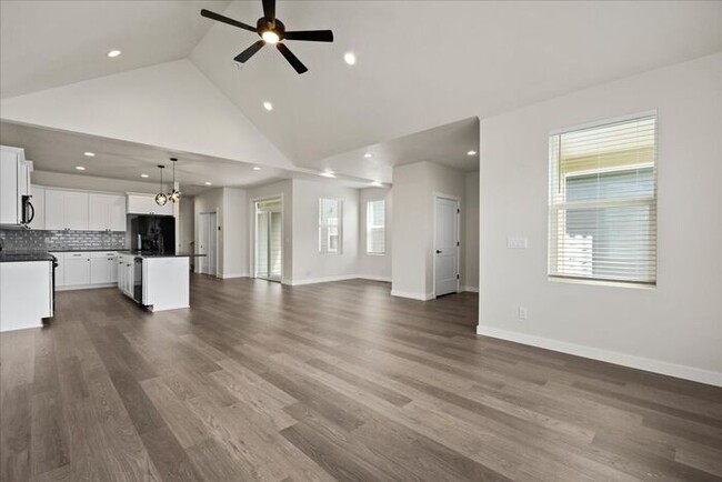 Building Photo - Brand New, Stylish 4-Bedroom Home with Vau...