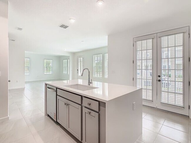 Building Photo - Brand New Luxury Town House in Island Village a Celebration, FL maintenance free community.