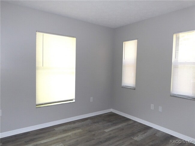 Building Photo - 8955 N Basswood Ave