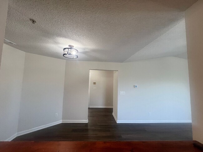 Building Photo - RENT SPECIAL! Freshly Painted! New Luxury ...