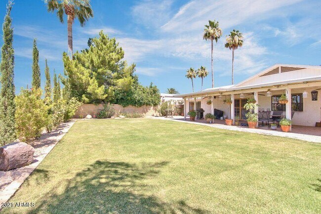 Building Photo - 6711 E Aire Libre Ln