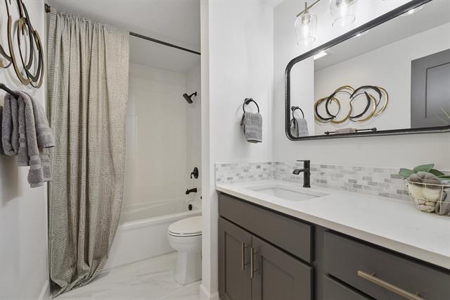 Building Photo - 2446 E 49th Ave