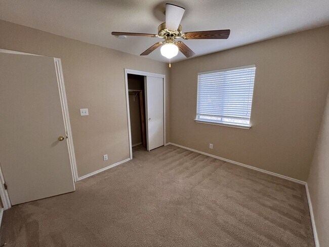 Building Photo - Generous Outdoor Space & Lawn Care Included!