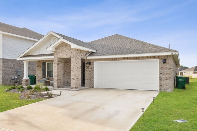 Building Photo - 4/2 Stunning Brick Home with community poo...