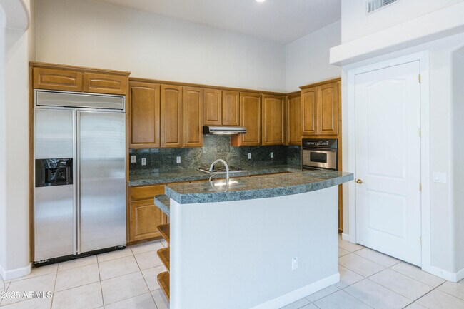 Building Photo - 7369 E Del Acero Dr