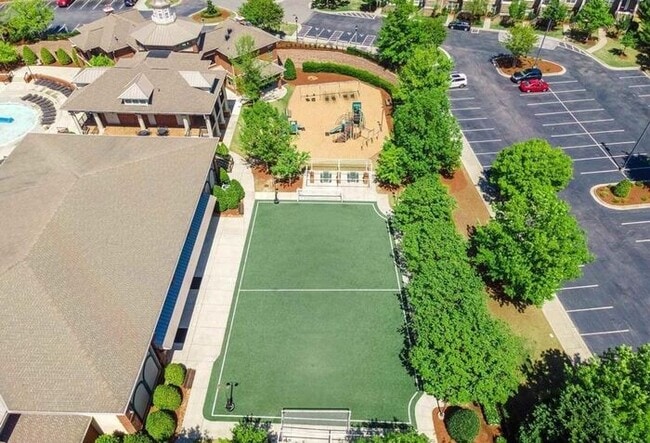 Building Photo - Charming Townhome with Open Layout, Back Patio & One-Car Garage – Near RTP, RDU & Everyday Conven...